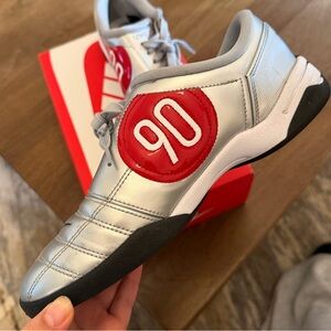 silver and red nike t90